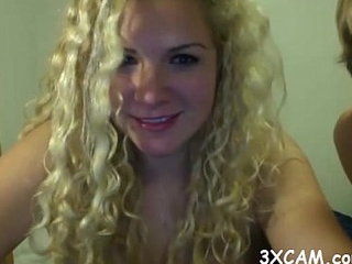 curly haired blonde teen sucking cock on webcam